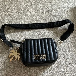 Lightly used Authentic Versace Jeans Couture purse.